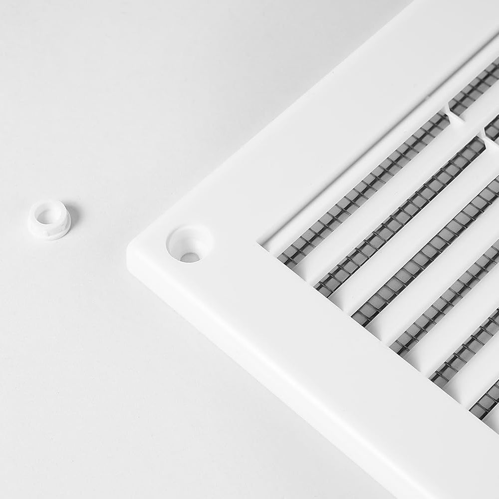 Close-up of Awenta air vent grille corner showing screw hole and cover cap.