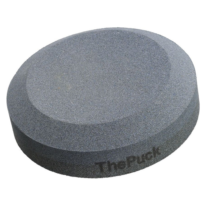 Lansky The Puck dual grit sharpening stone, grey rounded shape.